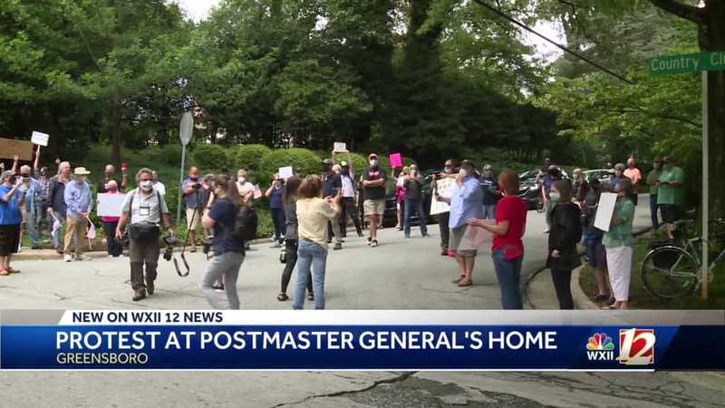 Hundreds protest in front of U.S. Postmaster General's house in Greensboro